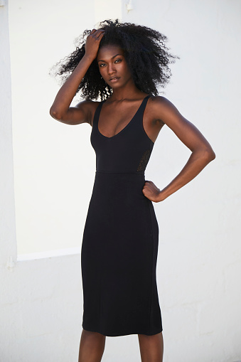 Stunning black girl in black dress, portrait