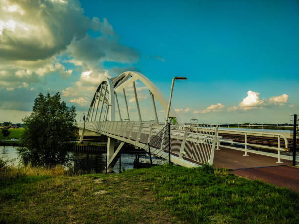 Train bridge and bike lane sky