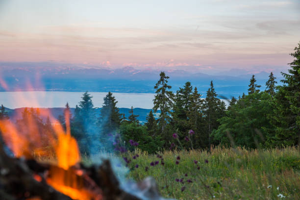 istock Outdoors Fire with Stone Hearth with Alps and Mont-Blanc Mountains in the Background 1024635014