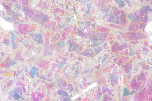 istock Light colourful glass background with shine on macro 1024638120