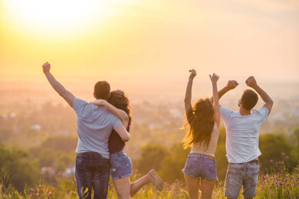 istock The four active people dancing on the sunset background 1024640974