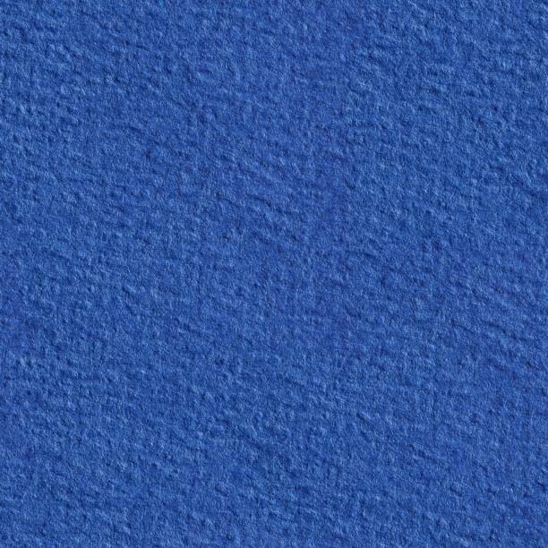 istock Texture of blue color a brushed paper. Seamless square texture 1024641330