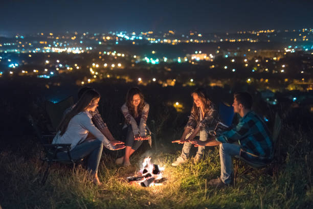 istock The five people rest near bonfire. night time 1024652884