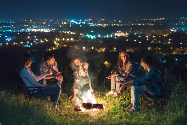 istock The five people rest near bonfire. night time 1024652892