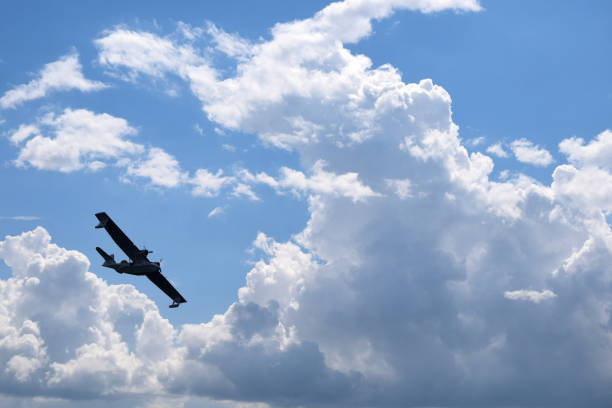 istock One big airplane with many propellers and a big engine and rotors flying through the sky below cloudy summer sky seen during one of trips in Poland 1024653070