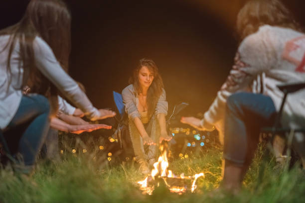 istock The people warming hands near the bonfire. evening night time 1024663874