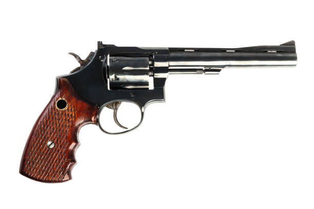 istock isolated black revolver on a white background 1024666400