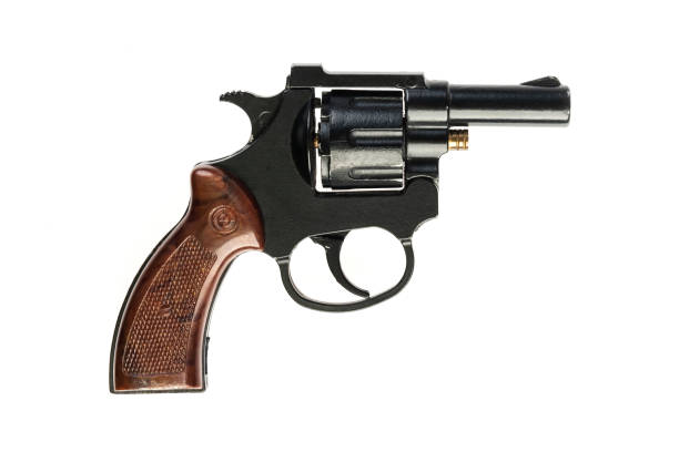 istock isolated black revolver on a white background 1024666490