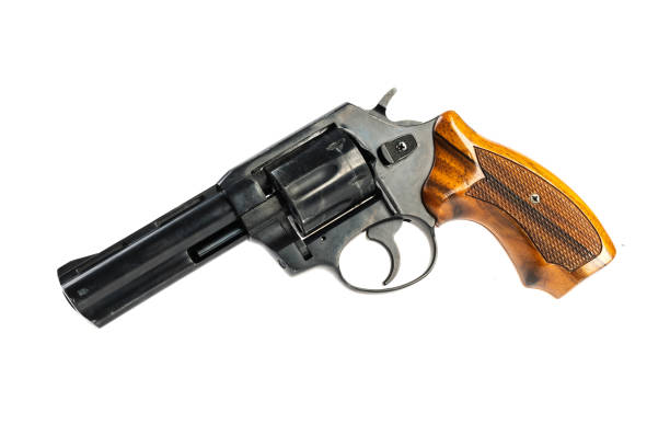 istock isolated black revolver on a white background 1024666528
