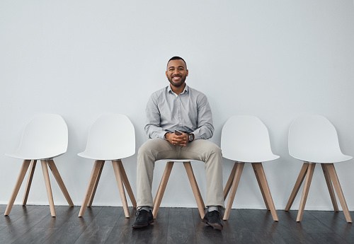 Portrait of a businessman sitting on a chair