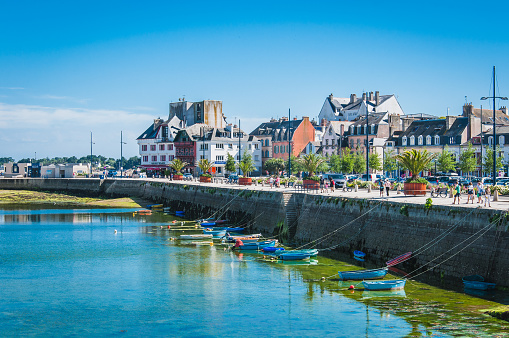 Boats moored along the wharf in the port of Concarneau