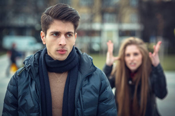 istock Young man turning back at his girlfriend 1024687180