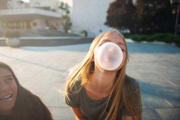 lower part of the face with a bubble of chewing gum