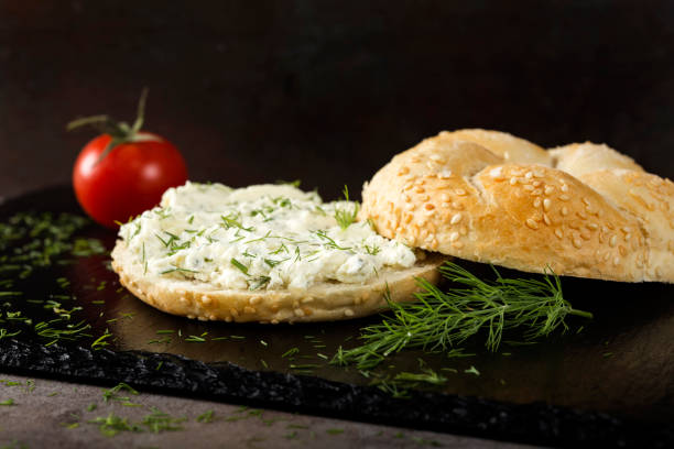 istock Slice of bread or bun with cream cheese 1024692940