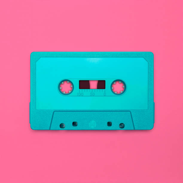 Cassette tape Nostalgic image of a cassette tape, isolated and presented in punchy pastel colors, blank for creative customization nostalgia 80s stock pictures, royalty-free photos & images