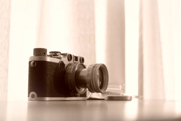 istock Vintage film camera in Retro tone. 1024730098