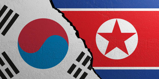 istock South Korea and North Korea flag, plastered wall background. 3d illustration 1024730546
