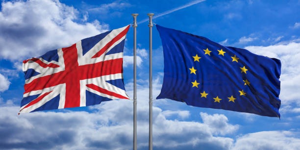 istock UK and European Union flags on blue sky background. 3d illustration 1024730614