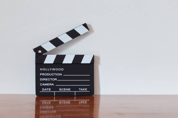 istock Movie clapper on wooden backgrond 1024734482