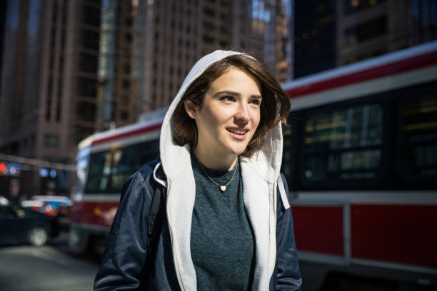 istock Young woman portrait in downtown Toronto 1024735270