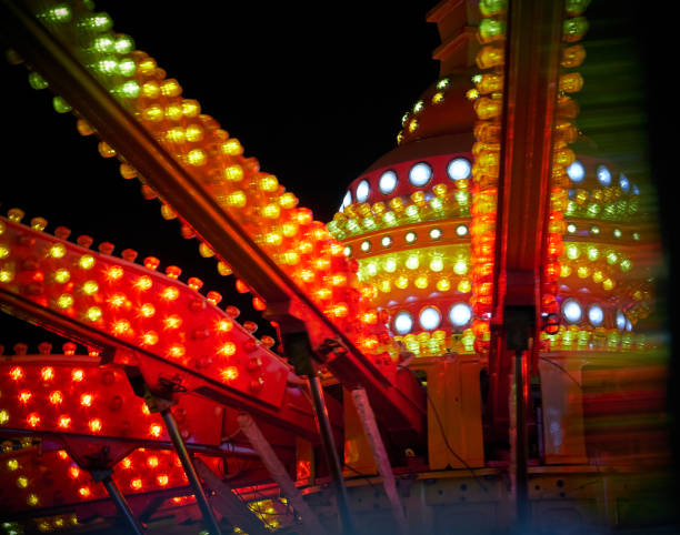 istock Close-up of old amusement park lights on black background 1024744232