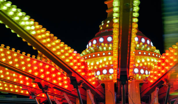 istock Close-up of old amusement park lights on black background 1024744242