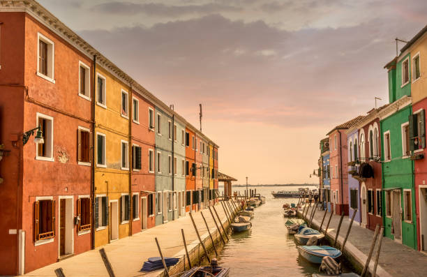 istock Murano sunset yellow cast on colorful houses 1024752998