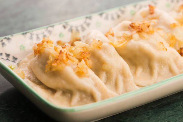 istock Polish pierogi filled with cabbage and mushrooms 1024761028
