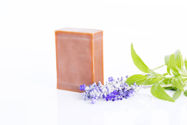 istock Handmade soap with lavender flowers on white background 1024765112