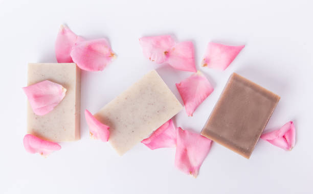 istock Top view of handmade soap with flower petals 1024767918