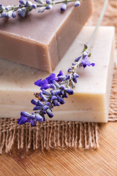 istock Handmade soap bars with lavender flowers, Closeup 1024775232