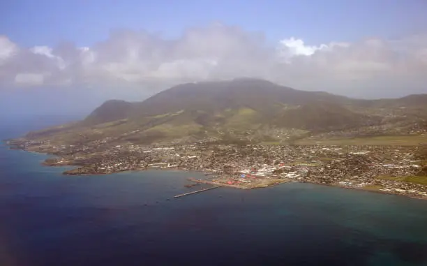 Photo of St Kitts island with its capital Basseterre at the center, St Kitts and Nevis - seen from the air - Mount Liamuiga