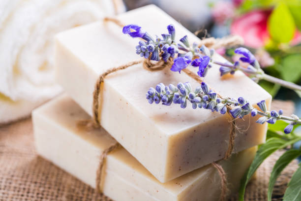 istock Handmade soap bars with lavender flowers on table 1024776326