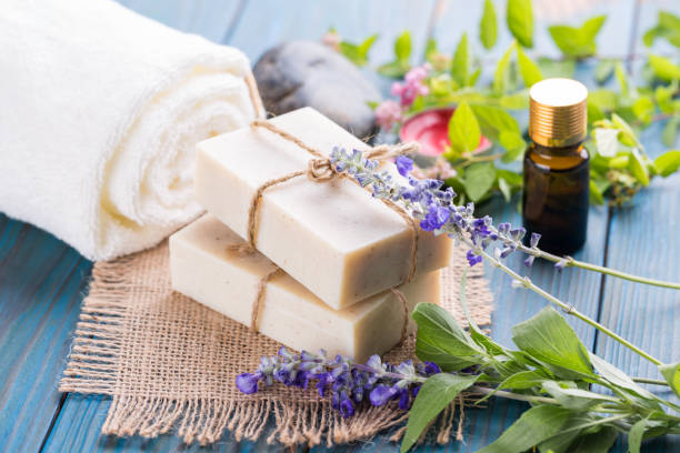 istock Handmade soap bars with lavender flowers on table 1024776334