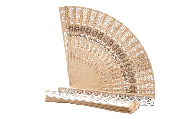 istock Wooden fan with lace on a white background 1024783106