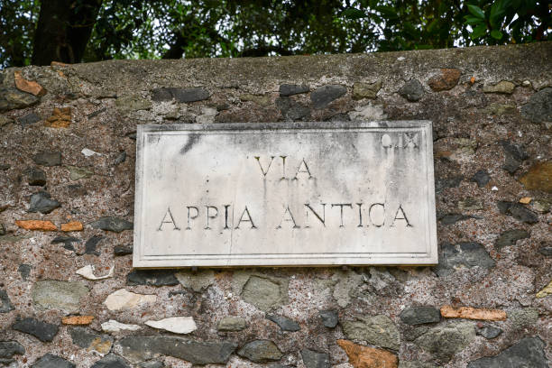 istock Ancient ruins in Rome (Italy) -  Name plate Via Appia (Appian Way) 1024784474