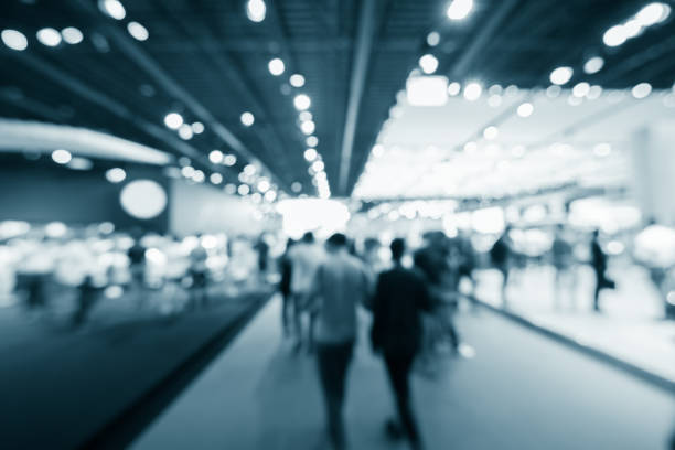 istock Defocused Image Of Crowd At Illuminated Restaurant 1024806404