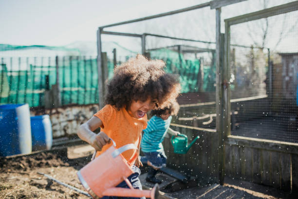 istock Water Fight at the Allotment 1024815538