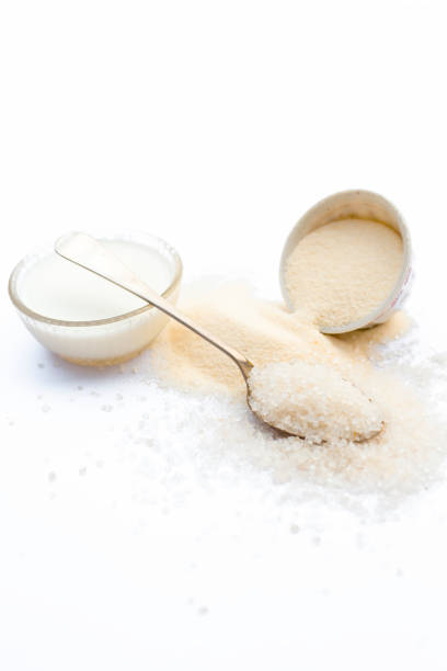 istock Entire ingredients for Suji ka halwa isolated on white  including sugar. 1024817164