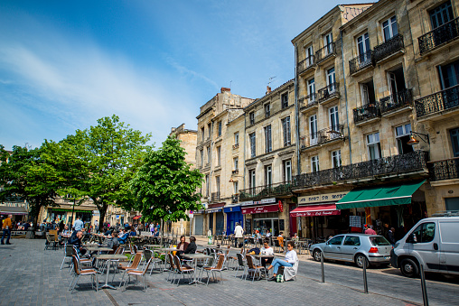 Bordeaux, France - May 02, 2018: People relaxing in outdoors cafe, Bordeaux, France