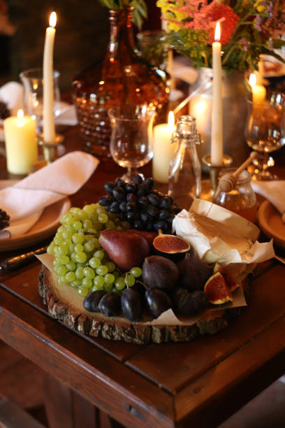 istock fruit grapes pear plum figs bowl decorated table 1024825472