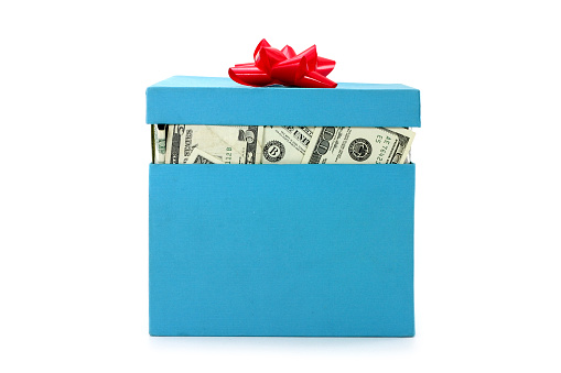 a box of us dollars, concept of making money, or money gift