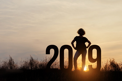 Silhouette woman and 2019 .Concept of a new year.