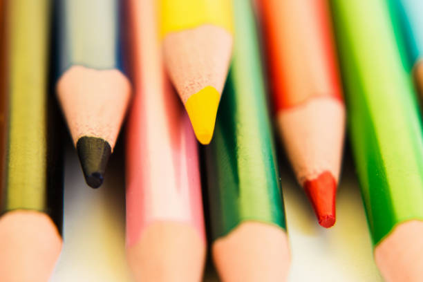 istock Color pencils isolated on white background, macro view. 1024846998
