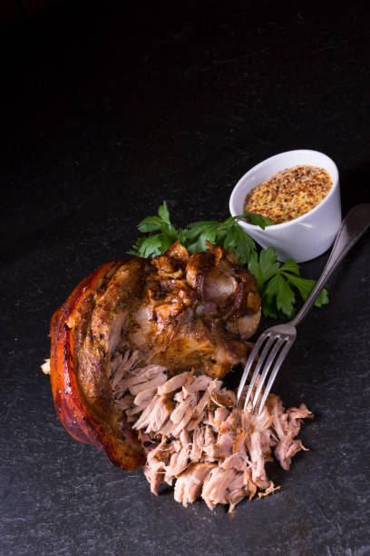 istock crispy fried Bavarian pork knuckle with soft meat 1024870720