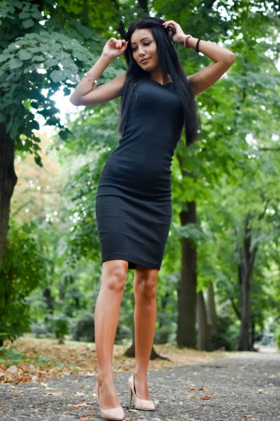 istock Elegant Young Woman Is Looking Away 1024883318