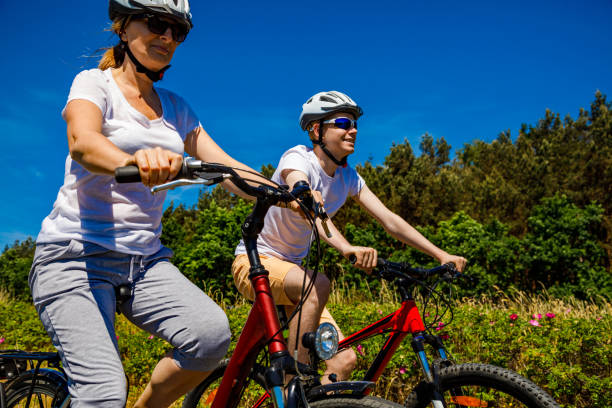 istock Healthy lifestyle - people riding bicycles at seaside 1024886178