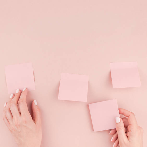 istock Woman hands with paper stickers 1024897526