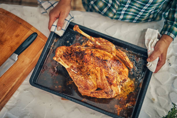 istock Preparing Stuffed Turkey for Holidays 1024919550