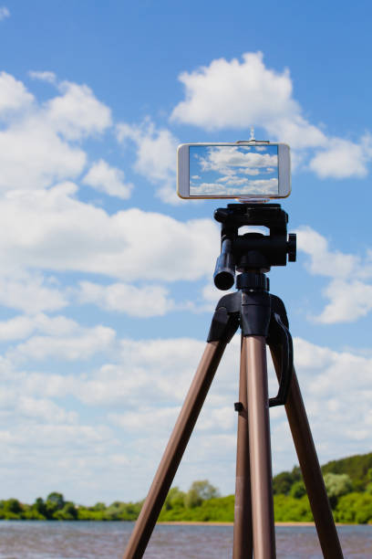 istock Using smartphone like professional photo camera on tripod 1024927788